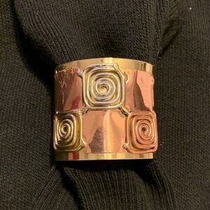 Elegant Gold and Copper Spiral Bracelet